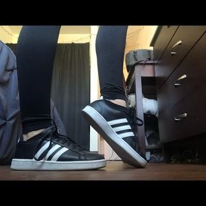 Black and white Addias memory foam sneakers